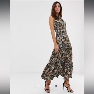 Floral maxi dress with gold zipper in the back and a back tie